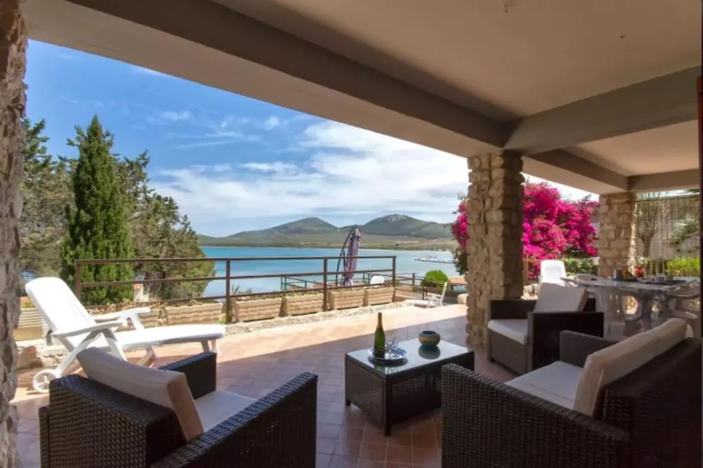Villa Flavia direttamente sul mare con terrazza incantevole per 6 persone Alghero Casa vacanze
