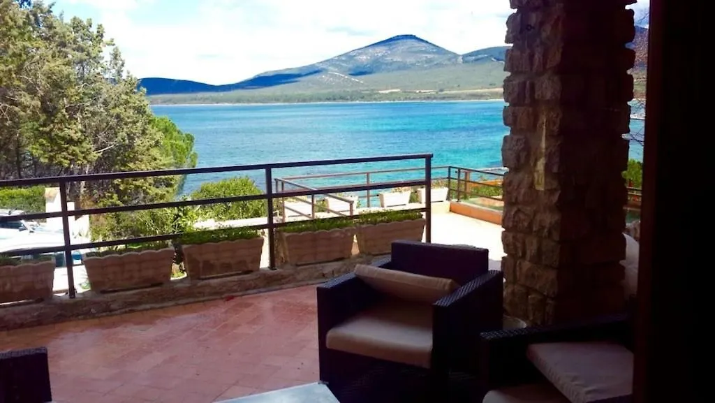 Casa vacanze Villa Flavia direttamente sul mare con terrazza incantevole per 6 persone Alghero